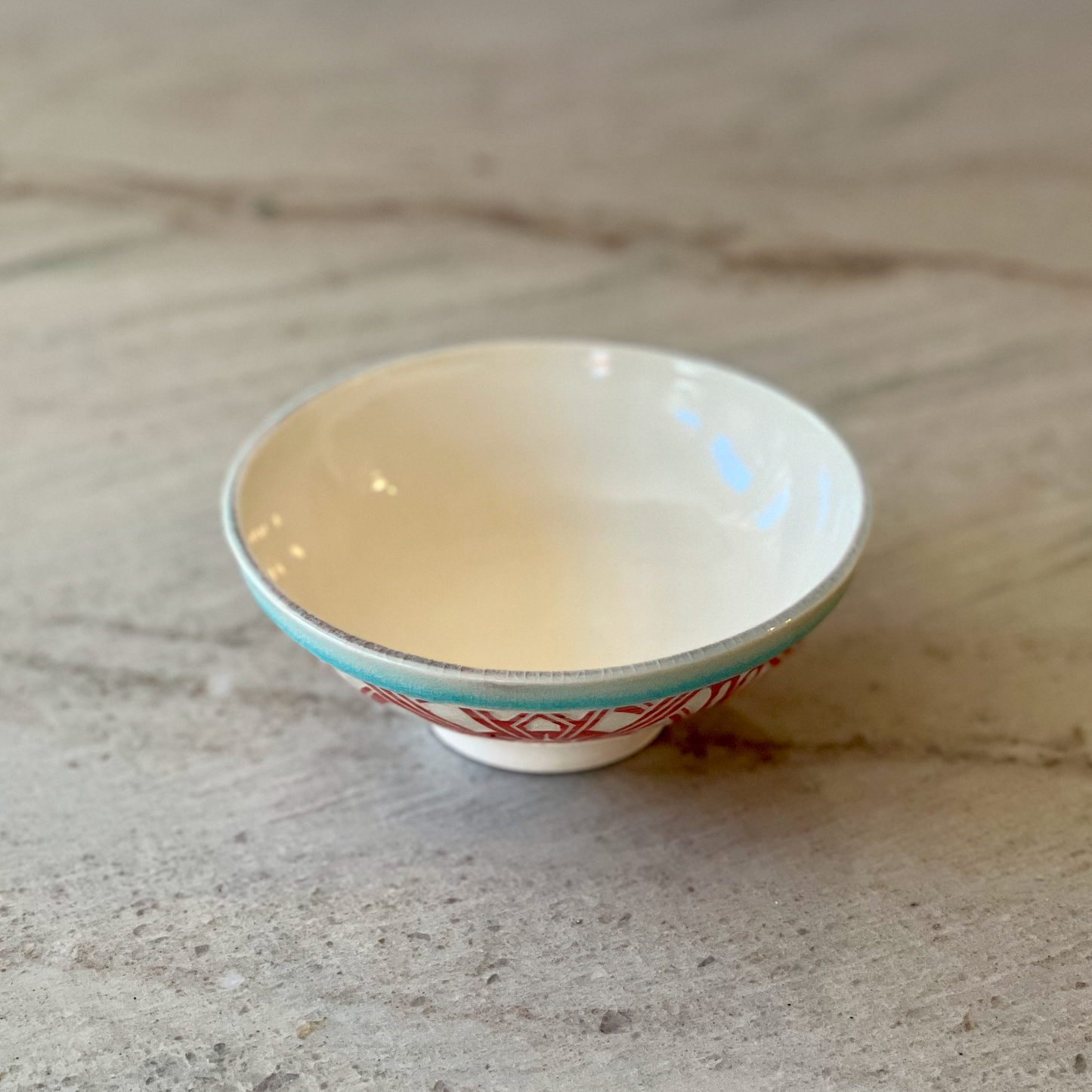 Porcelain Bowl with Geometric Red Slip Carving