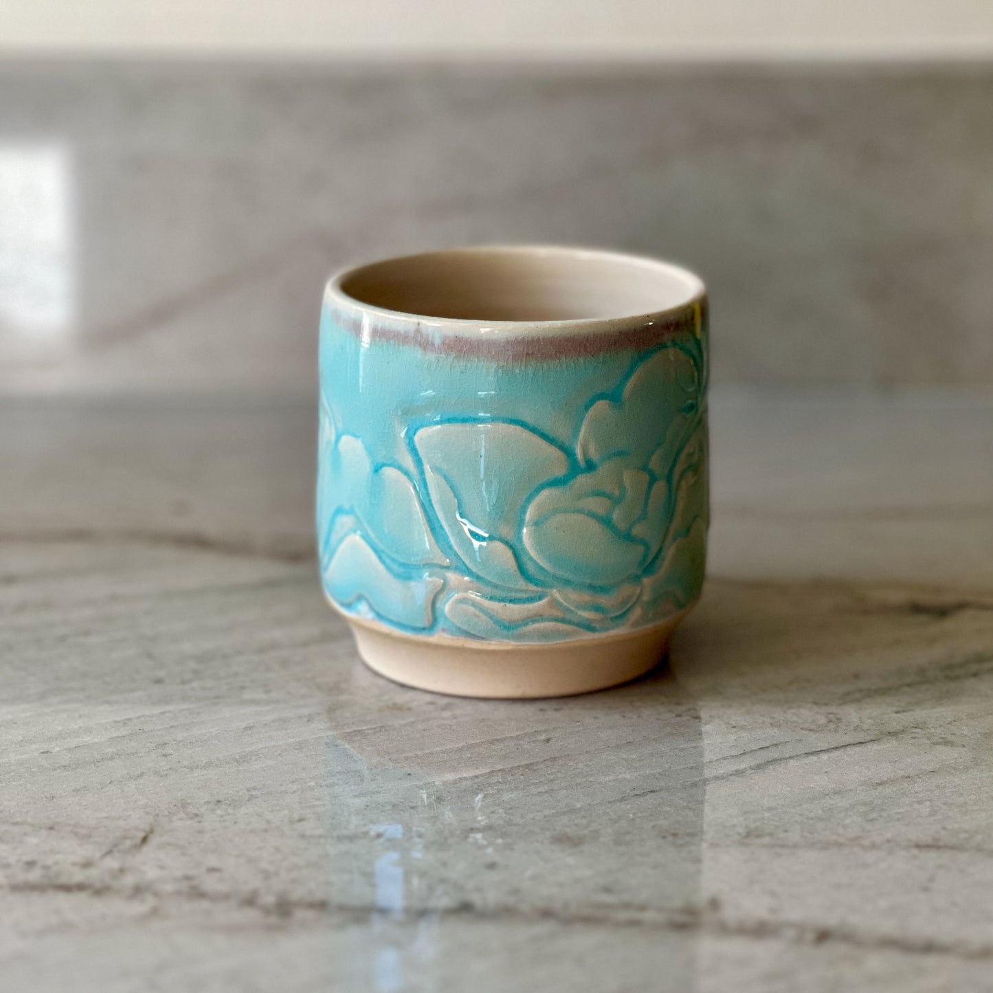 Small Floral Carved Cup, White Clay, Translucent Blue Glaze