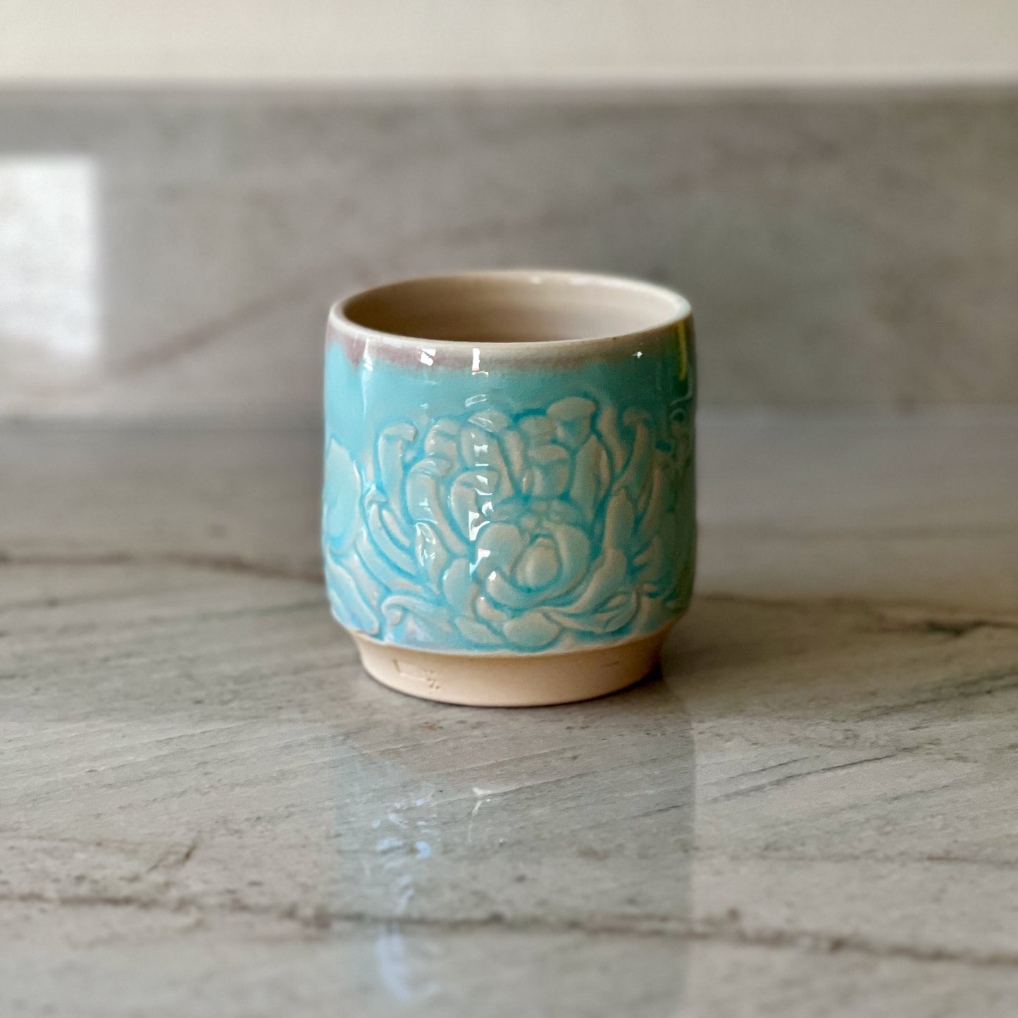 Small Floral Carved Cup, White Clay, Translucent Blue Glaze