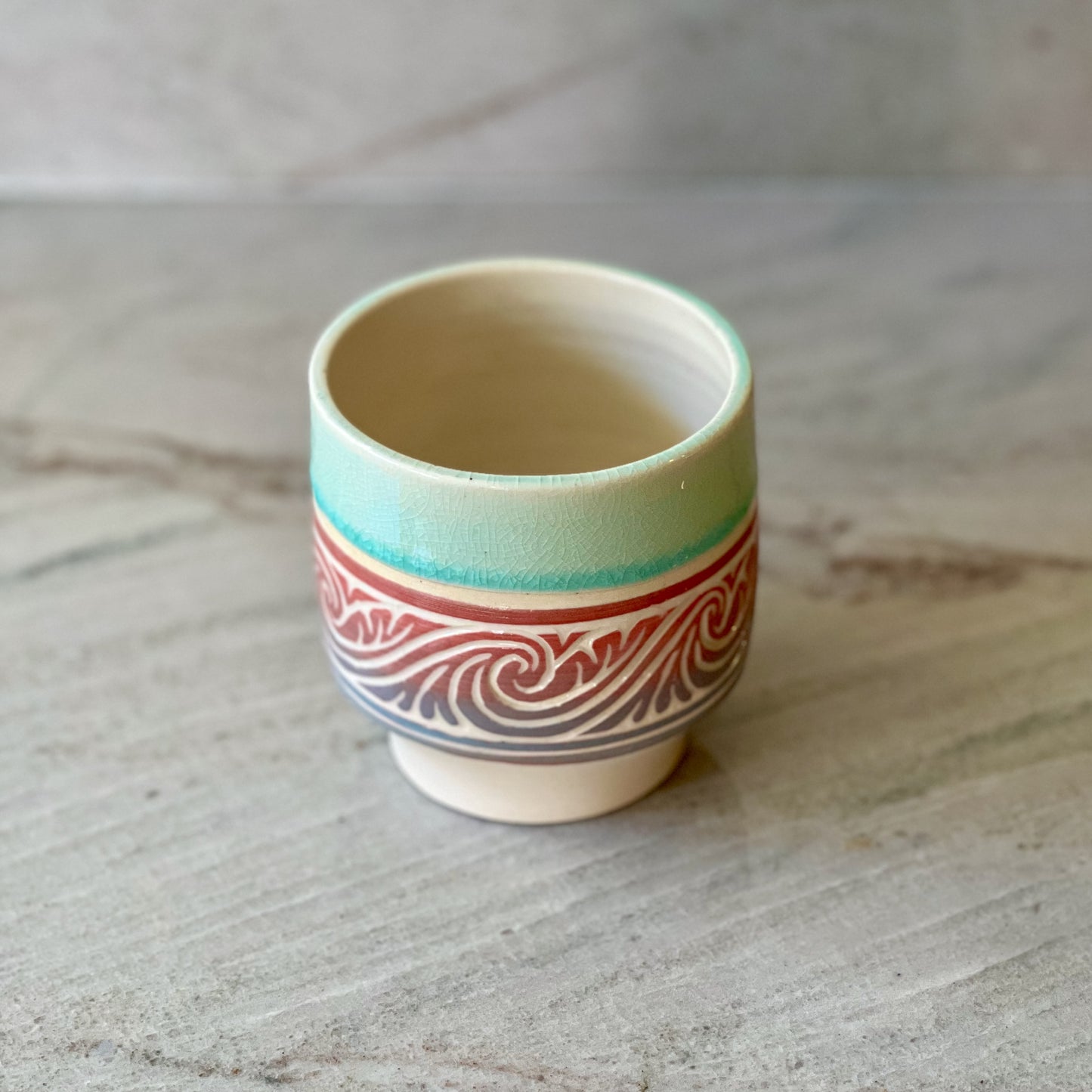 White Clay Cup, Red and Blue Detail