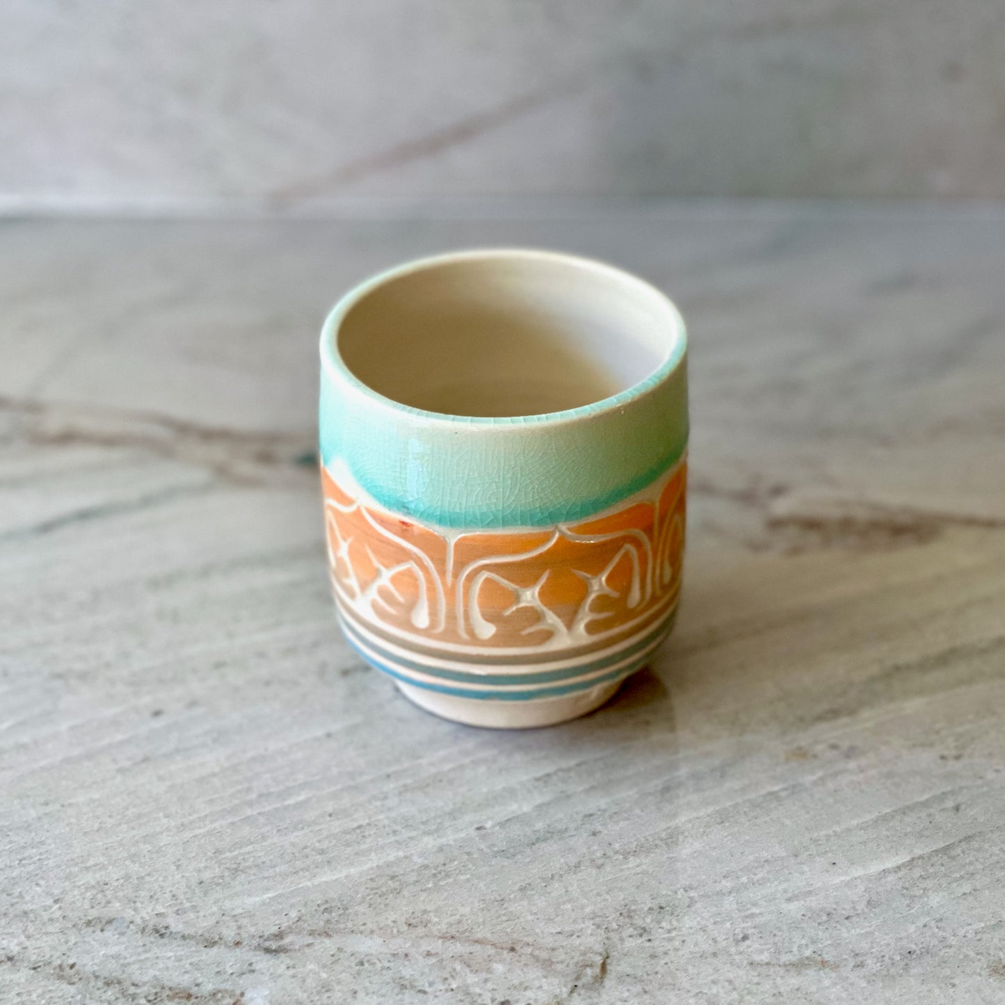 White Clay Cup, Orange and Blue Detail