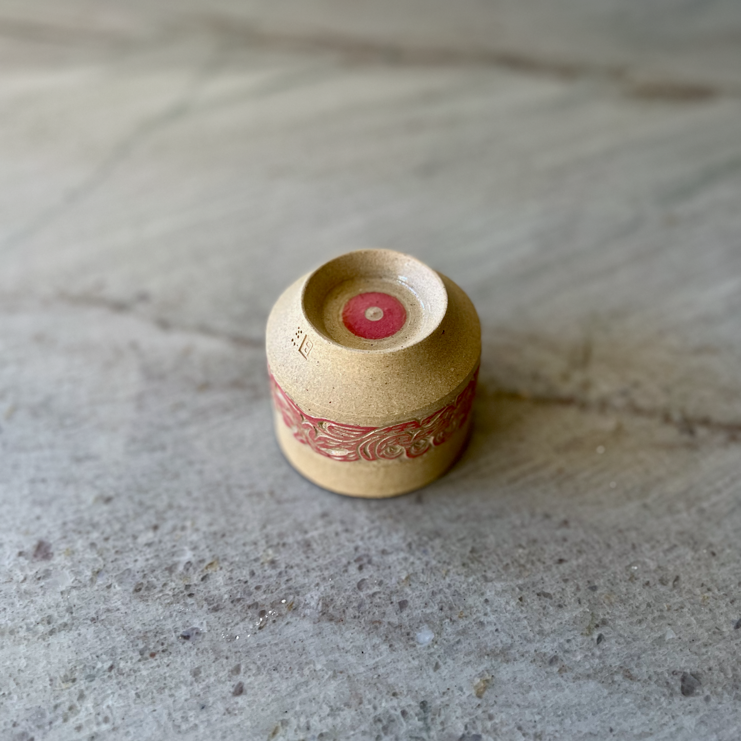 Sandy Clay Teacup with Red Carving 1