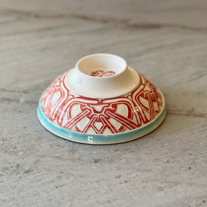 Porcelain Bowl with Geometric Red Slip Carving