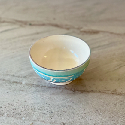Porcelain Bowl with Floral Red and Blue Slip Carving