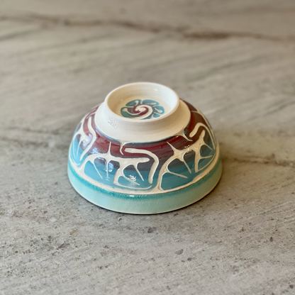 Porcelain Bowl with Floral Red and Blue Slip Carving