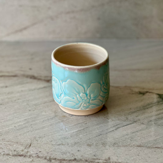 Small Floral Carved Cup, White Clay, Translucent Blue Glaze