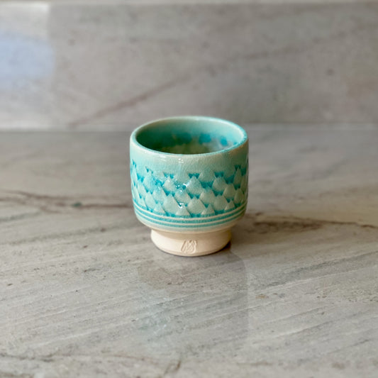 Small White Clay Cup, Scale Pattern and Blue Glaze