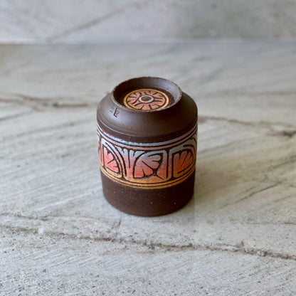 Charcoal Clay Cup, Orange, Red, and Blue Detail