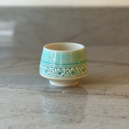 Porcelain Cup with Relief Carving, Translucent Blue Glaze