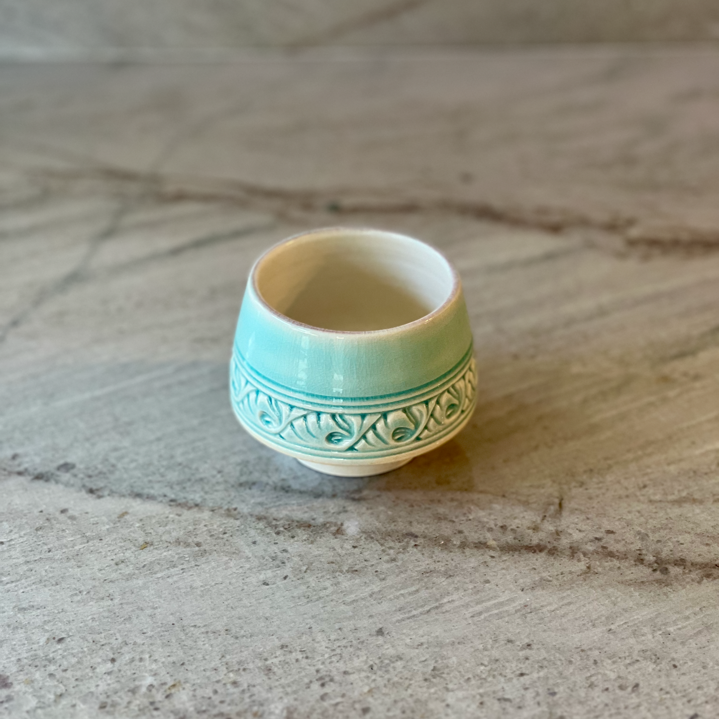 Porcelain Cup with Relief Carving, Translucent Blue Glaze