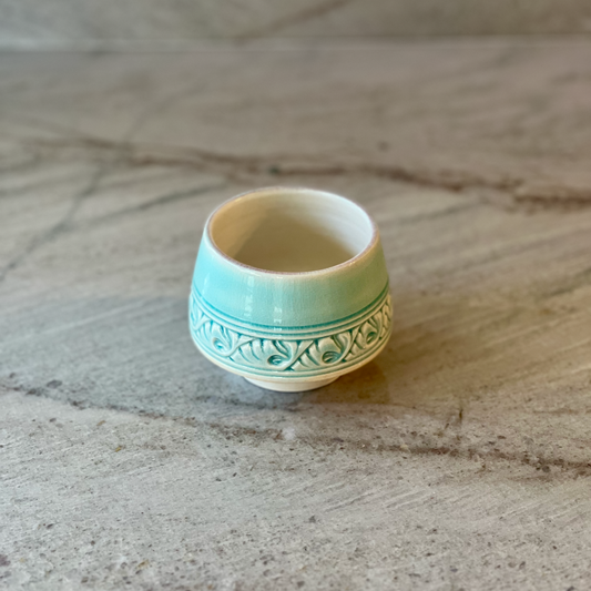 Porcelain Cup with Relief Carving, Translucent Blue Glaze