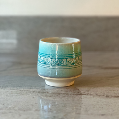 Porcelain Cup with Relief Carving, Translucent Blue Glaze