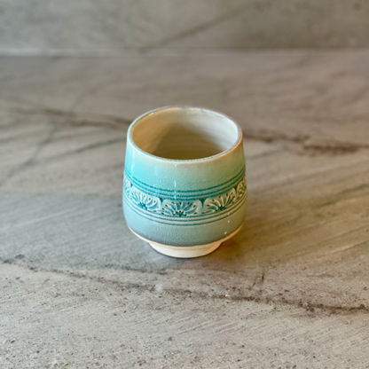 Porcelain Cup with Relief Carving, Translucent Blue Glaze