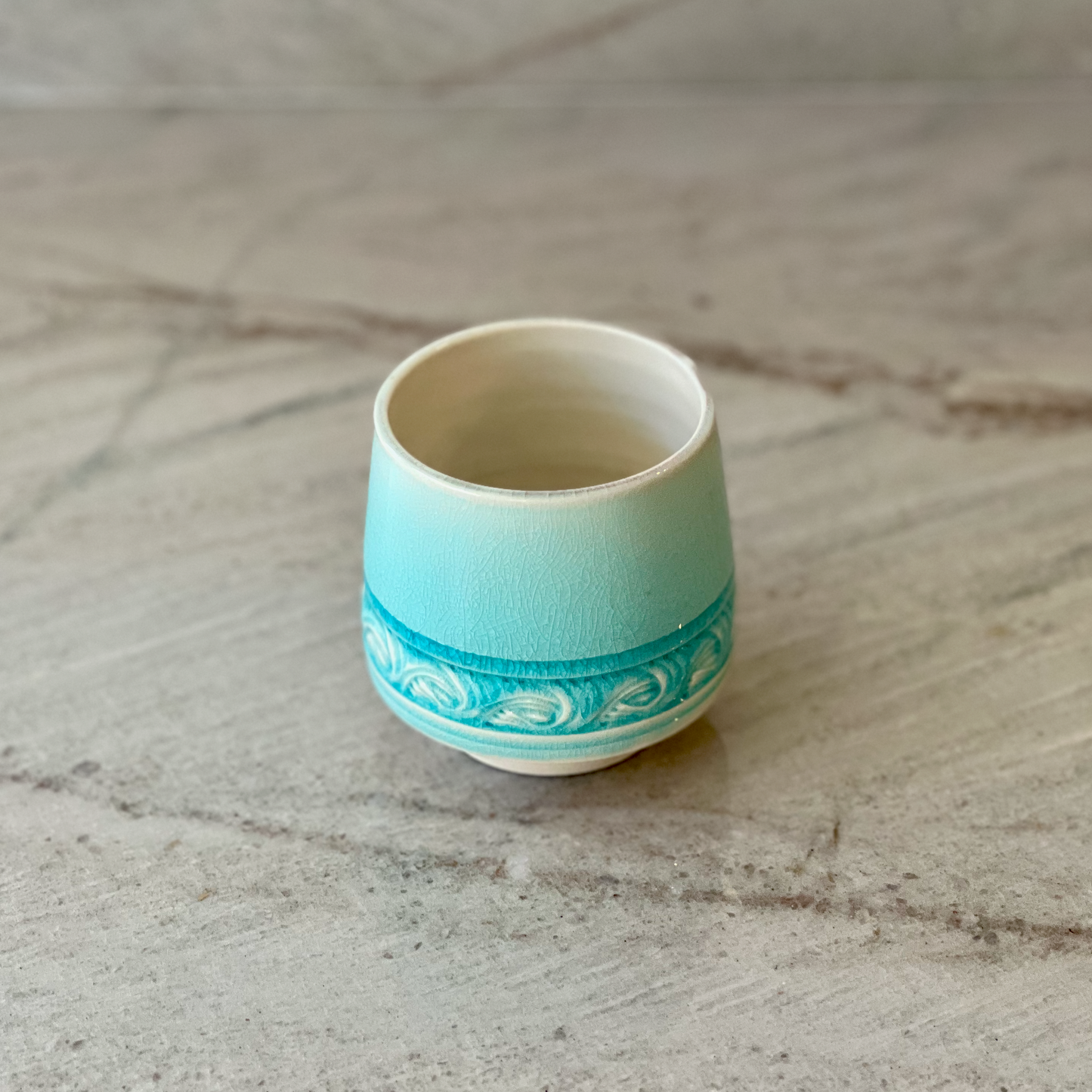Porcelain Cup with Relief Carving, Translucent Blue Glaze