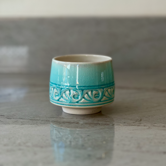 Porcelain Cup with Relief Carving, Translucent Blue Glaze