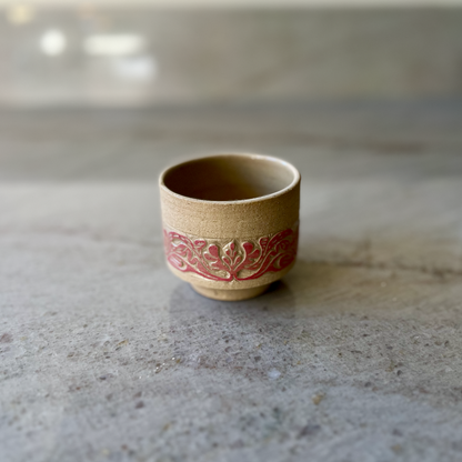Sandy Clay Teacup with Red Carving 1