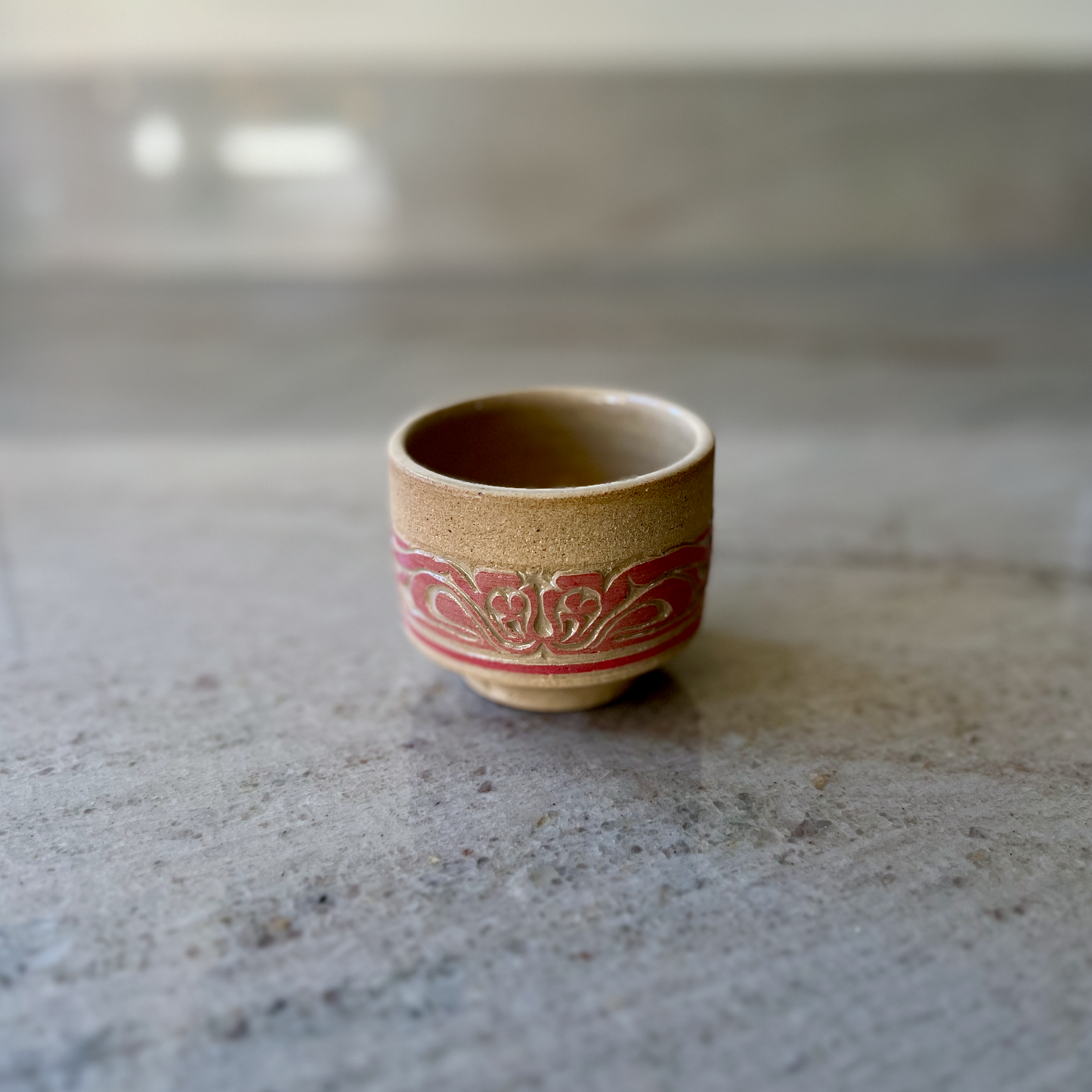 Sandy Clay Teacup with Red Carving 3
