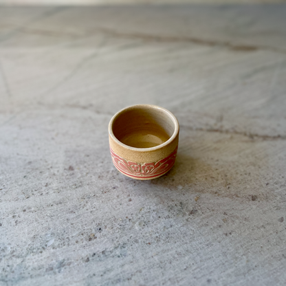 Sandy Clay Teacup with Red Carving 3