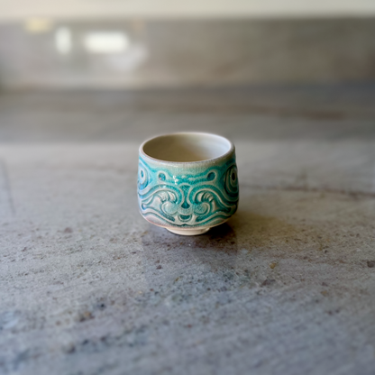 Porcelain Teacup with Blue Fish Relief Carving