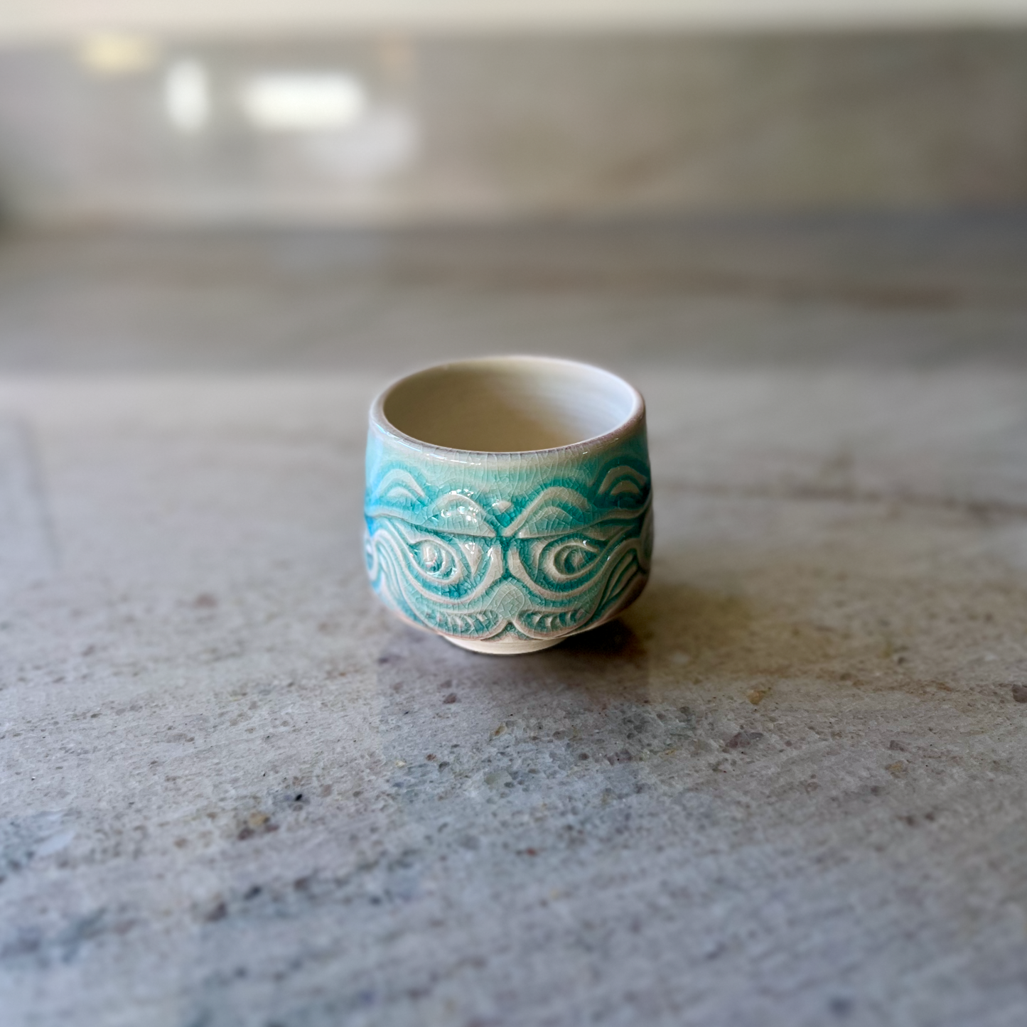 Porcelain Teacup with Blue Fish Relief Carving