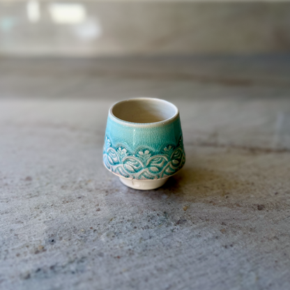 Porcelain Teacup with Blue Floral Relief Carving