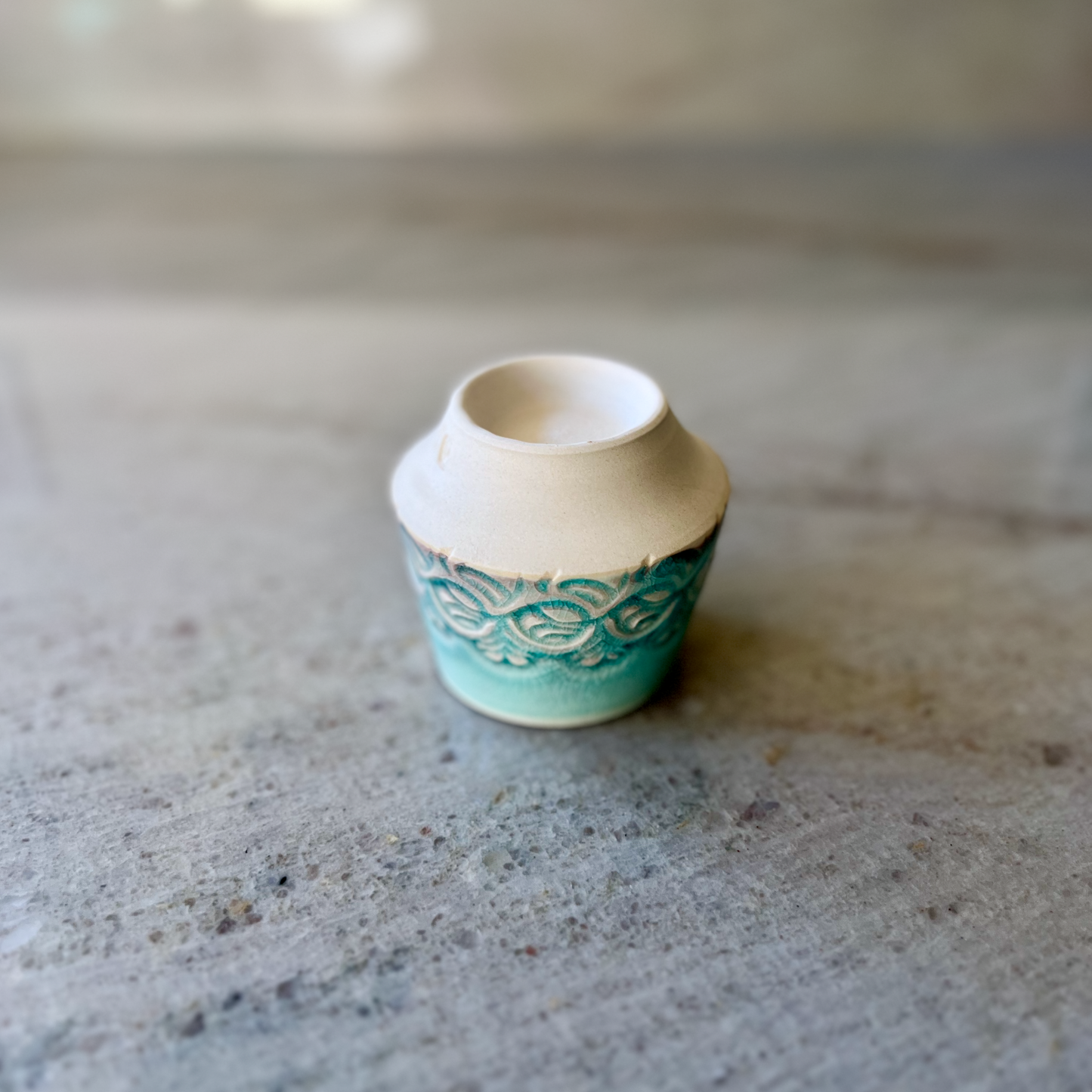 Porcelain Teacup with Blue Floral Relief Carving