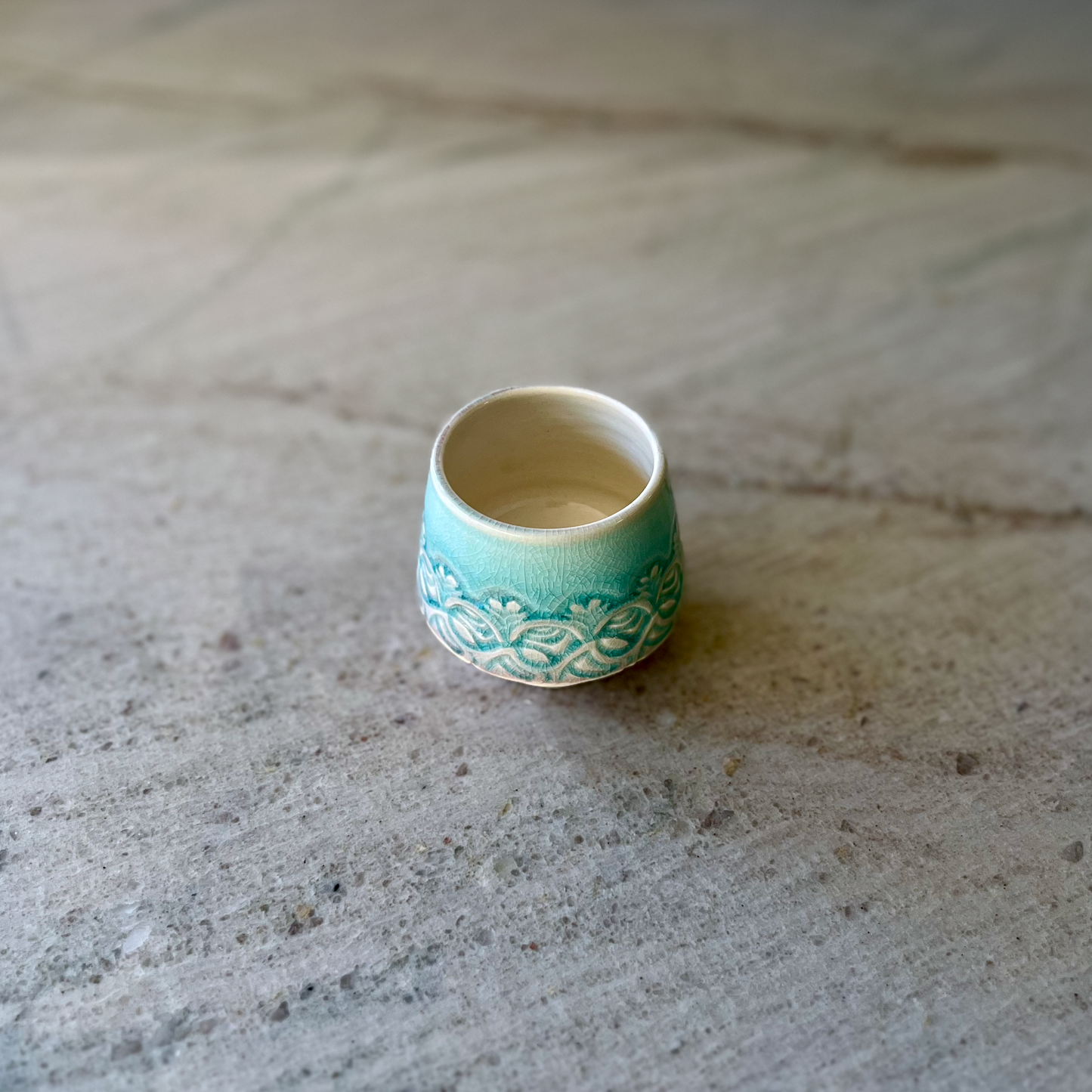 Porcelain Teacup with Blue Floral Relief Carving